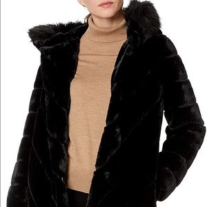 Brand new, never worn Calvin Klein faux fur coat.
